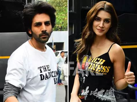 kriti sanon and kartik aaryan have a pose session as they get clicked in bkc