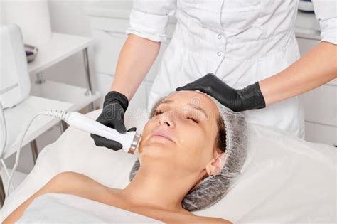 Beautician Makes Ultrasound Skin Tightening For Rejuvenation Woman Face Using Phonophoresis