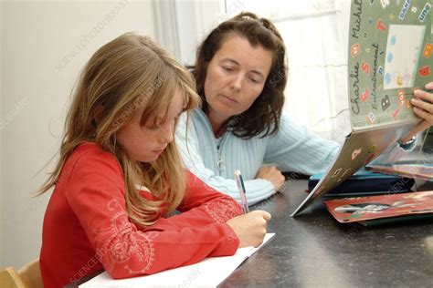 Mother Helping Her Daughter With Homework Stock Image H4600405