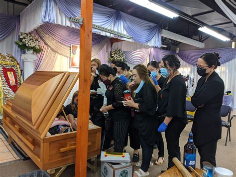 Protecting the living while serving the dead, Hmong funerals adapt to