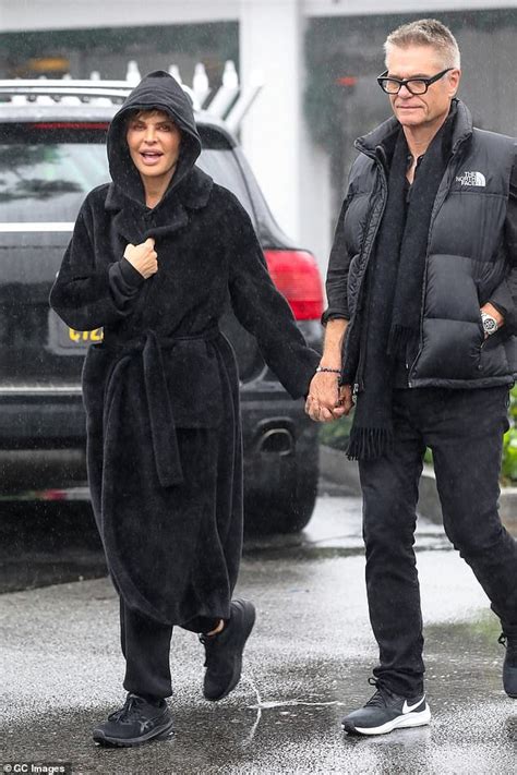 Lisa Rinna And Husband Harry Hamlin Brave The Rain During An Outing In
