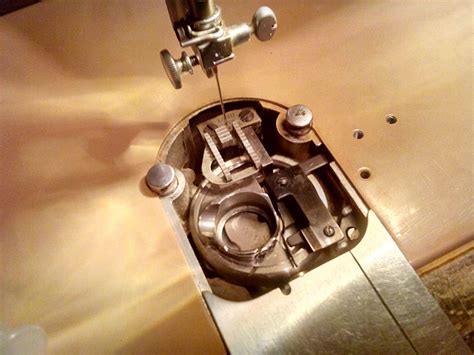 Bobbin Case And Thread Escapement On A Singer 403 Bobbins Sewing