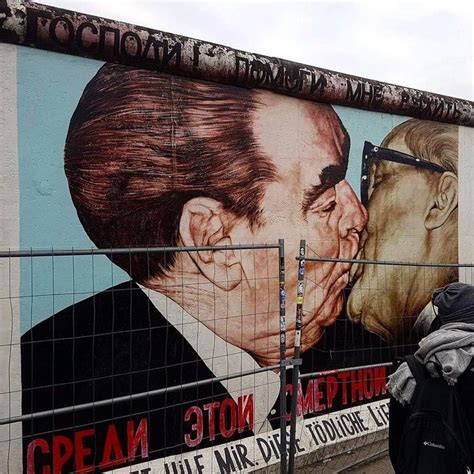 Graffiti On The Berlin Wall The Fraternal Kiss Between Honecker And