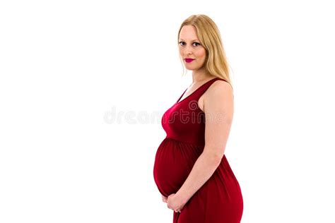 pregnant woman in red dress holding belly on white background stock image image of expectant