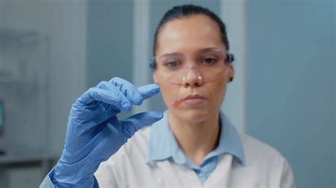 Portrait Of Doctor In Laboratory Analyzing Stock Footage SBV 346609172