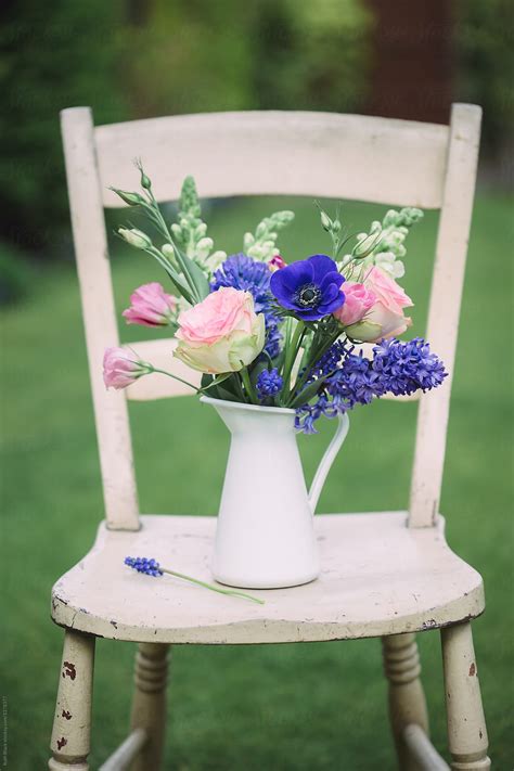 Flowers On A Rustic Chair By Stocksy Contributor Ruth Black Stocksy
