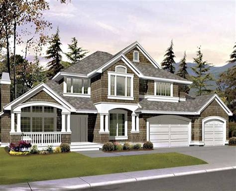 Two Story Custom Home With Exterior Shake Detailing Has