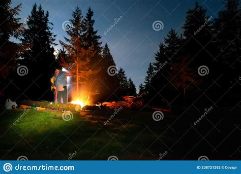 Bonfire In Night Forest With People Stock Photo Image Of Beautiful