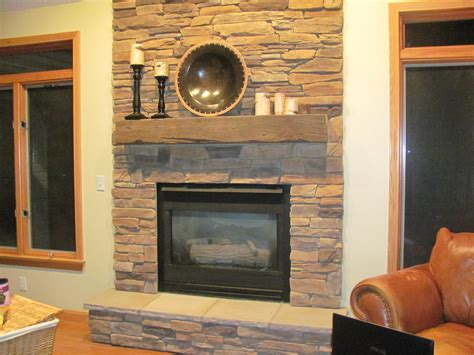 Stacked stone fireplace stone fireplaces with neatly stacked stones offer that classic and simple look. Beautiful Stone Fireplace in your Home | Q-HOUSE