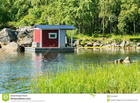 Maybe you would like to learn more about one of these? Cabin on water stock photo. Image of abode, daytime, house ...