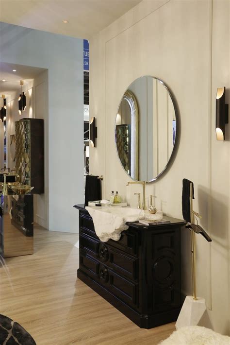 They bounce light around a room, helping brighten choose one wall decorate with mirrors in a living room. An Inspiring Interior Design Guide to Decorating with Wall Mirrors