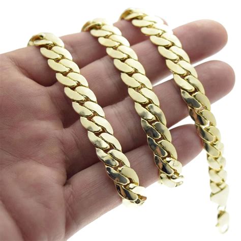 Secures with a lobster claw clasp. Miami Cuban Gold Chain 24" 10MM - Chains