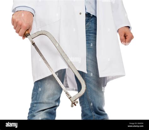 Crazy Doctor Is Holding A Big Saw In His Hands Isolated On White Stock