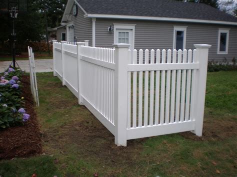 This is a picture of a bamboo privacy fence. Vinyl Fence Gallery - Round Hill Fence