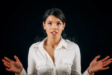 Portrait Of A Young Woman In Awe Holding Hands Raised Stock Image