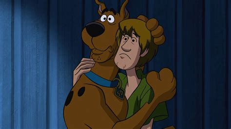 Scooby And Shaggy Looking Man Hugging Each Other