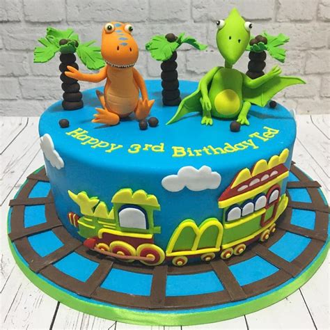 Use milk chocolate candies for spikes along back of dinosaur. Dinosaur Train cake 🚃..#cakesbyCCC #dinosaurtraincake # ...