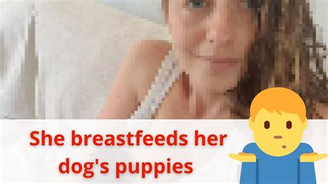A Woman Breastfeeding Her Dogs Puppies Youtube