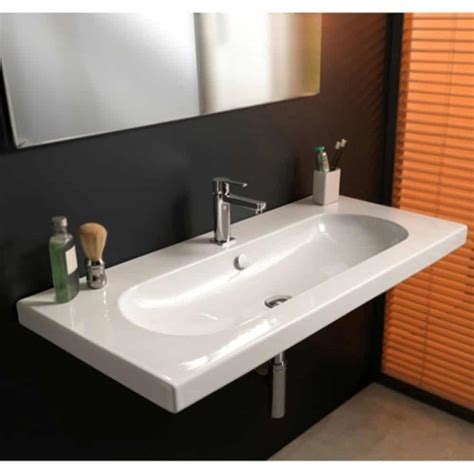 White porcelain bathroom sinks in rectangular shapes are traditional and one of affordable options. 40 Bathroom Vanity Ideas for Your Next Remodel PHOTOS