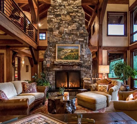 Dramatic Wood Burning Stone Fireplace Is The Living Rooms Focal Point