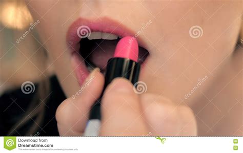 Woman Putting Red Lipstick Looking In Mirror Makeup At Night Getting
