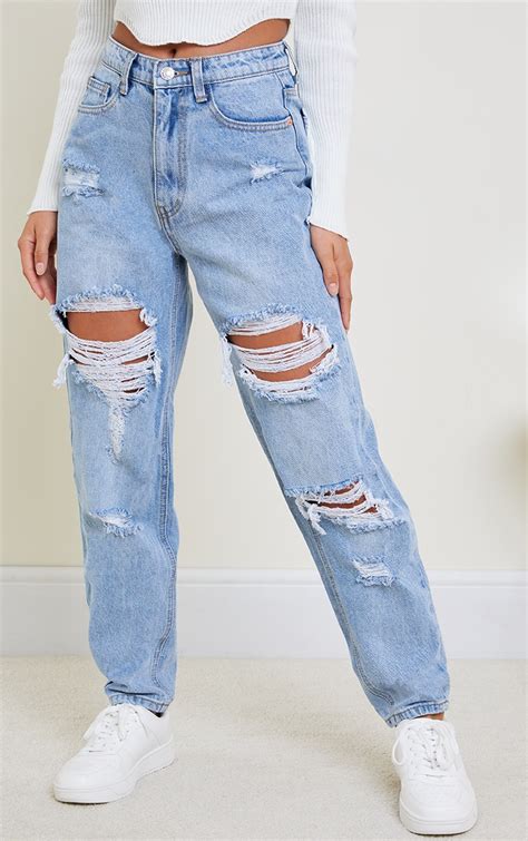 Plt Petite Light Blue Wash Ripped Mom Jeans Prettylittlething Usa