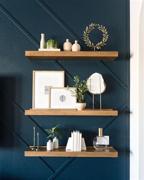 Heres A Closeup Of The Floating Shelves On The Dark Blue Wall From The