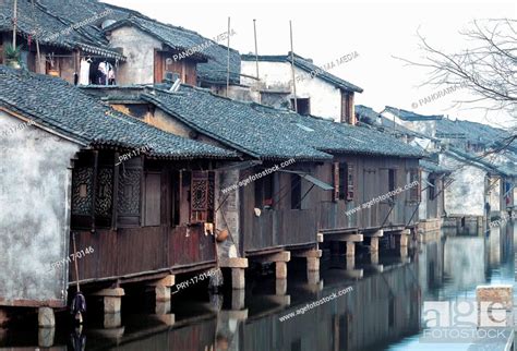 The Traditional Chinese Folk Houses Along A River Of Wu Town In The