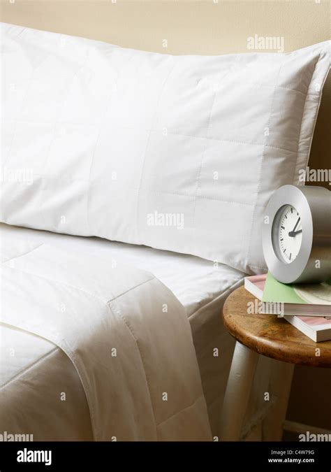Bed And Nightstand Stock Photo Alamy