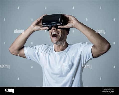 Amazed African American Man Using Vr Headset Glasses Feeling Excited