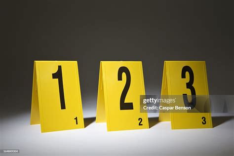 Three Evidence Markers Arranged In A Row In Numerical Order Photo