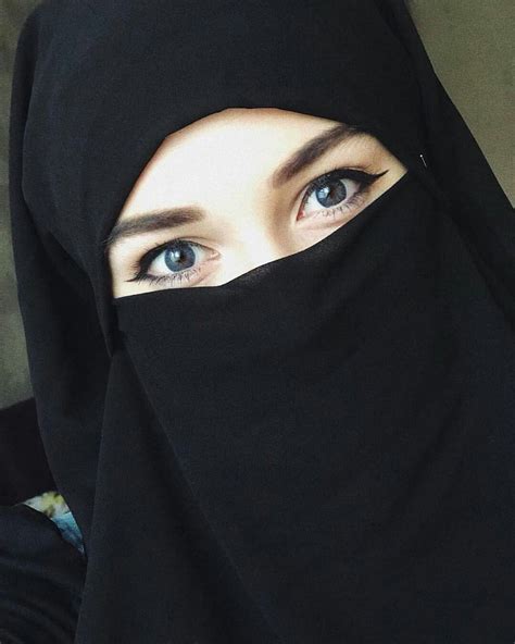 hijab or niqab crossword clue