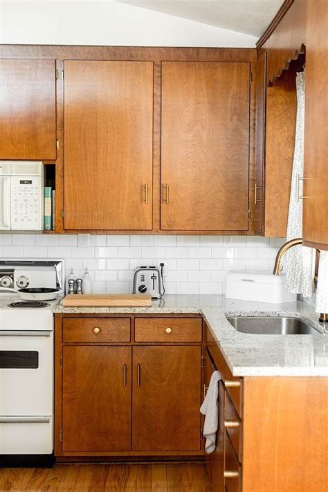 Custom modern nontoxic kitchen cabinetry is european inspired, american made. Brand New Brass Hardware In Our Mid-Century Kitchen | Mid ...