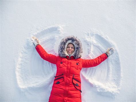 Premium Photo Snow Angel Made By A Happy Woman In The Snow Top Flat Overhead View