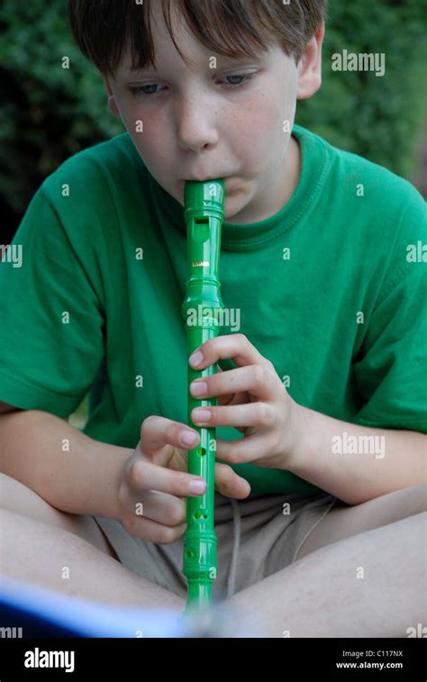 Young Boy Playing Recorder Stock Photo Alamy