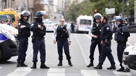 paris knife attack officer killed at police headquarters live updates cnn