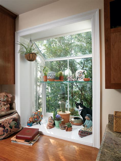 Enjoy flowers and plants year round with garden windows. Garden Window Decorating Ideas to Brighten Up Your Home ...