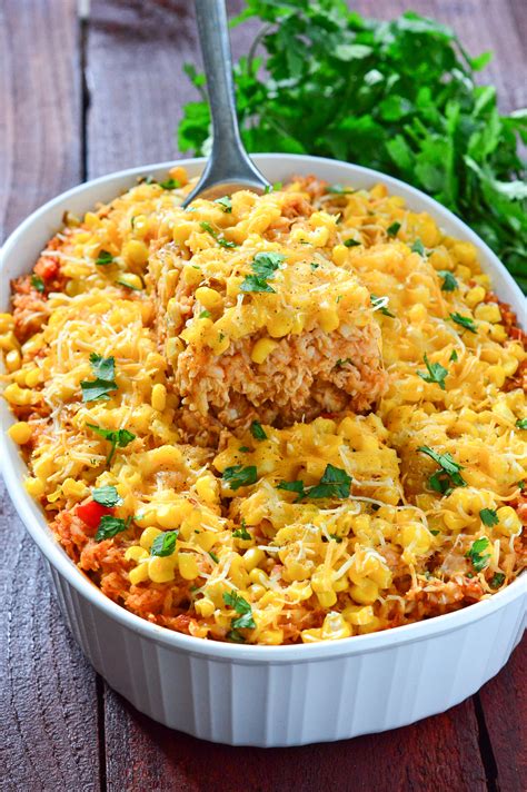 It's easy comfort food that your whole family will love. Chicken Enchilada Rice Casserole - The Lemon Press
