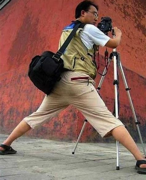 These Photographer Poses Prove You Do Whatever It Takes To Get The Shot