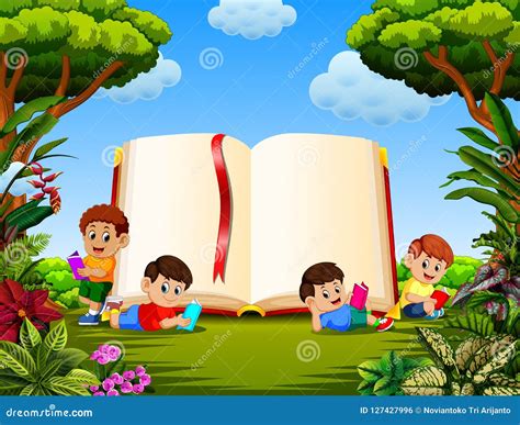 The Children Reading The Book In The Different Posing With The Big Book