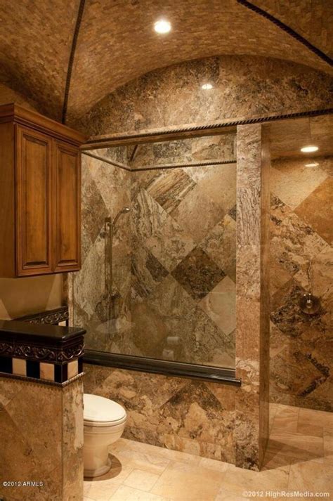This beautiful bathroom remodel project offers a tuscan feel and a contrast of color and texture from the polished marble floor to the textured travertine walls. 25 Tuscan Bathroom Design Ideas - Decoration Love