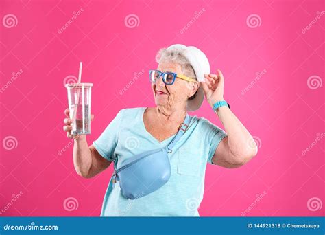 Portrait Of Cool Grandmother With Drink Stock Photo Image Of Active