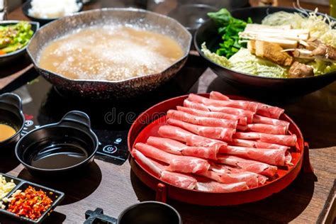 Japanese Shabu Hot Pot With Sliced Beef On Chopstick Stock Photo