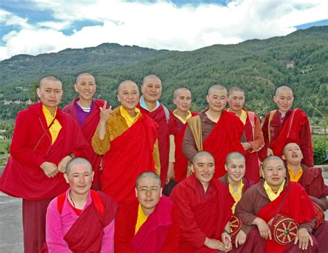 Bhutan Nuns In Red Group Shot Sweet Breathing Deepening Into A