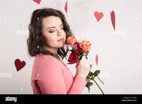 Woman Holding Roses Stock Photo Alamy