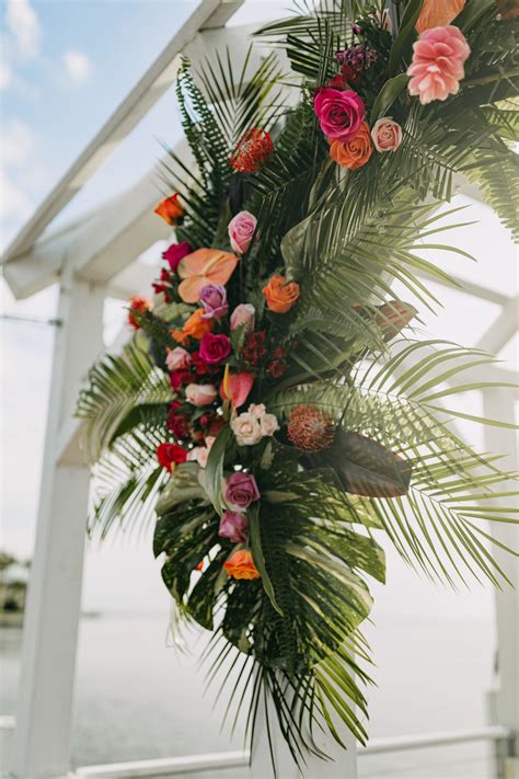 Tropical Colorful Wedding Floral Arrangement, Monstera Leaves, Palm Tree Leaves, Red, Orange and ...