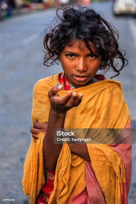 Poor Indian Girl Asking For Help Stock Photo Download Image Now A