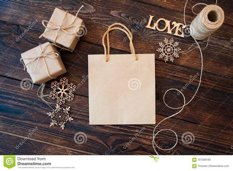 Download Mockup Paper Bag From Kraft Paper And Christmas Gift Boxes ...