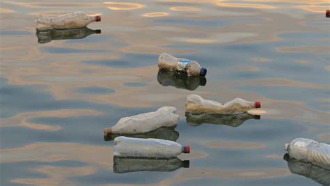Plastic Bottles Floating On Water Hd Plastic Water Bottles From