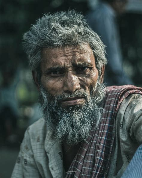 Download Old Indian Man Vivid Portrait Wallpaper